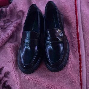 these are black shoes in a medium size never has been worn